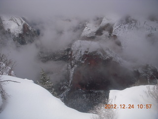 148 84q. Zion National Park - cloudy, foggy Observation Point hike - view of Angels Landing from the top