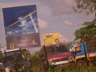 30 8f3. Uganda - drive to eclipse - billboards