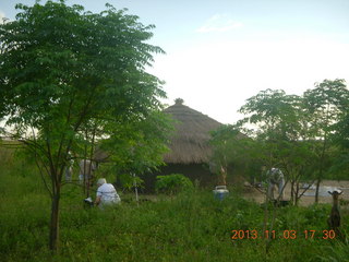 Uganda - eclipse site - sun behind clouds