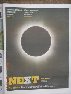 Uganda - drive back to Kampala - Daily Monitor newspaper on the eclipse