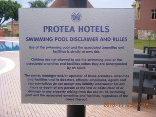 Uganda - Entebbe - Protea Hotel sign (too many lawyers)