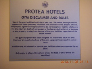 Uganda - Entebbe - Protea Hotel sign (too many lawyers)