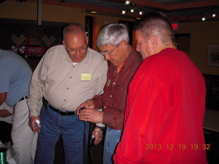 Jim taking a picture of the Arizona Innovation Challenge award