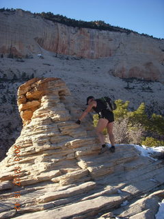 2135 8gt. Zion National Park - Angels Landing hike - at the top - Adam climbing a hill