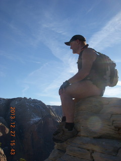 2139 8gt. Zion National Park - Angels Landing hike - at the top - Adam sitting on a hill