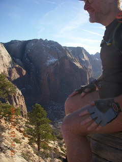 2140 8gt. Zion National Park - Angels Landing hike - at the top - Adam sitting on a hill