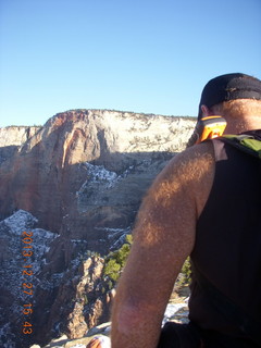 2141 8gt. Zion National Park - Angels Landing hike - at the top - Adam sitting on a hill