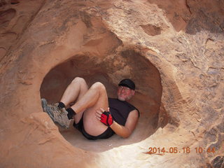 2328 8mg. Arches National Park - Devil's Garden hike - Adam in hole in the rock