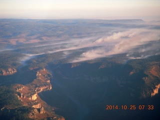1779 8sr. aerial - Grand Canyon just after dawn - low clouds on the north rim