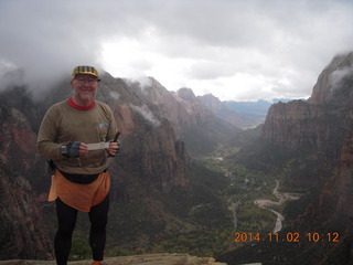 2464 8t2. Zion National Park Angels Landing hike - Adam at the top with Forman Acton's slide rule