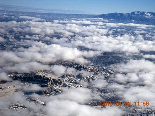 37 8v2. aerial - snow and clouds and canyon