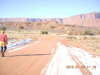 113 8v3. driving from Fisher Towers hike - Adam running (back) - tripod and timer