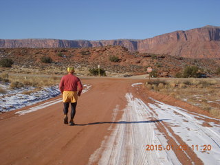 114 8v3. driving from Fisher Towers hike - Adam running (back) - tripod and timer
