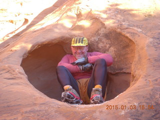 2571 8v3. Arches National Park - Devils Garden hike - Adam in hole in the rock - tripod and timer