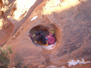 2573 8v3. Arches National Park - Devils Garden hike - Adam in hole in the rock
