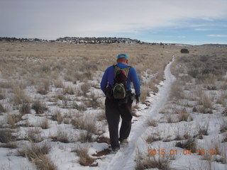 116 8v4. Canyonlands National Park - Lathrop trail hike - Adam running (back)