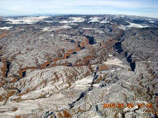 213 8v5. aerial - snowy canyonlands - Colorado hills