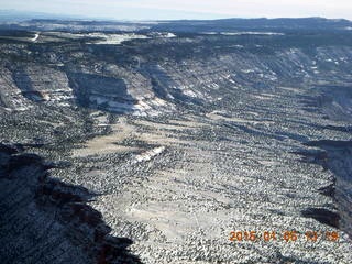 217 8v5. aerial - snowy canyonlands - Colorado hills