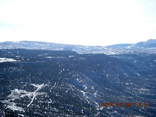 223 8v5. aerial - snowy canyonlands - Colorado hills
