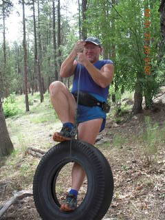 Debbie's and Ted's cabin - Adam on tire