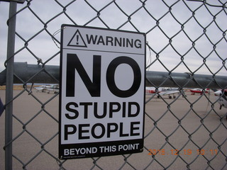 Warning No Stupid People sign