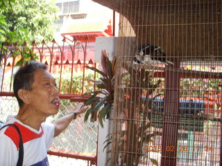 Bangkok - Phisit's place - Phisit and bird