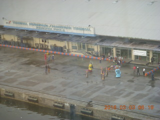 Indonesia - Jakarta port seen from ship - people to greet us