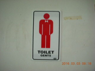 64 993. bathroom sign