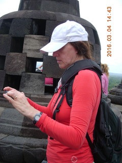 Indonesia - Borobudur temple - woman taking a picture