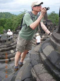 Indonesia - Borobudur temple - man taking a picture