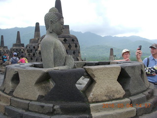 Indonesia - Borobudur temple - exposed Buddha inside bell