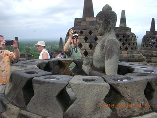 Indonesia - Borobudur temple - exposed Buddha inside bell