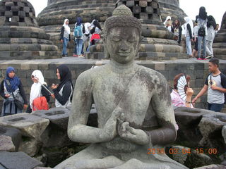 Indonesia - Borobudur temple - exposed Buddha inside bell