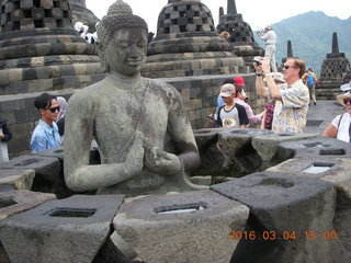 Indonesia - Borobudur temple - exposed Buddha inside bell