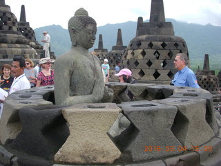 Indonesia - Borobudur temple - exposed Buddha inside bell