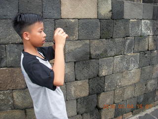 Indonesia - Borobudur temple - exposed Buddha inside bell