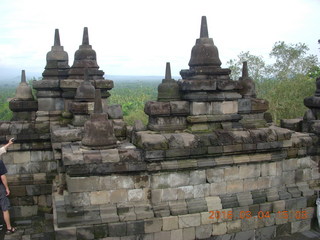 Indonesia - Borobudur temple - exposed Buddha inside bell