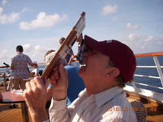 45 999. Bill Speare using his eclipse-viewing board