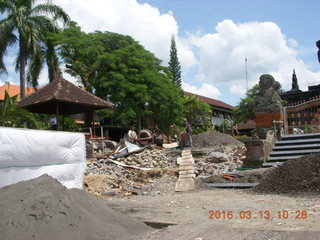 Indonesia - Bali - temple at Klungkung - outside - guys working in the heat