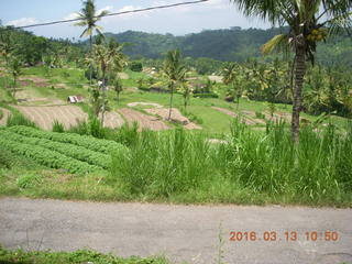 Indonesia - Bali - temple at Klungkung - outside - guys working in the heat