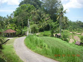 Indonesia - Bali - temple at Klungkung - outside, guys working in the heat