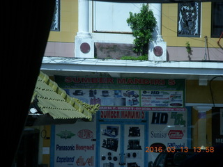 Indonesia - Bali - bus ride - monument - technology store