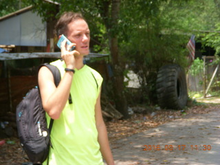 80 99h. Malaysia - Kuala Lumpur - Exciting Mountain Hike - Mathieu making a call