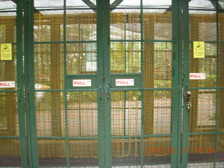 105 99h. Malaysia - Kuala Lumpur - KL Bird Park - doors keeping birds in