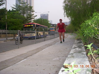 214 99j. Malaysia, Kuala Lumpur, Geo Hotel run - Adam running (tripod and timer)