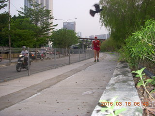 215 99j. Malaysia, Kuala Lumpur, Geo Hotel run - Adam running (tripod and timer)