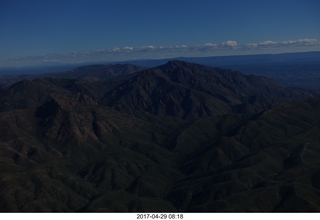 darkened aerial photo of mountains