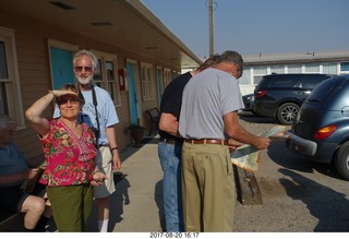 Thermopolis El Rancho Motel - eclipse friends - - Louise, Howard and others reading a map