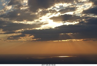 aerial - Riverton to Rock Springs - sun behind clouds, rays