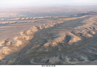 aerial - Riverton to Rock Springs - winding river in wide wash